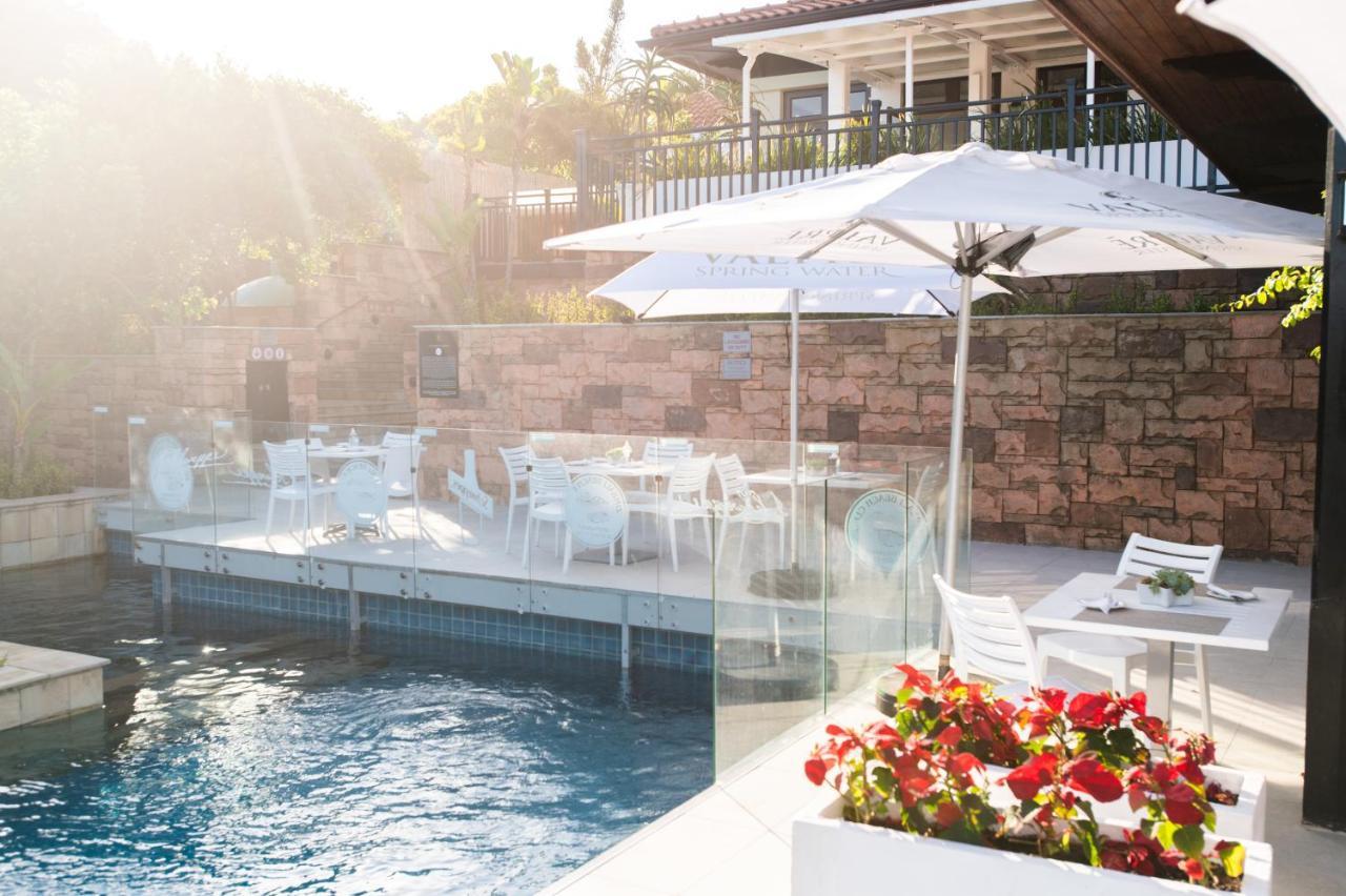 The Capital Zimbali Hotel Ballito Exterior foto The pool at the hotel