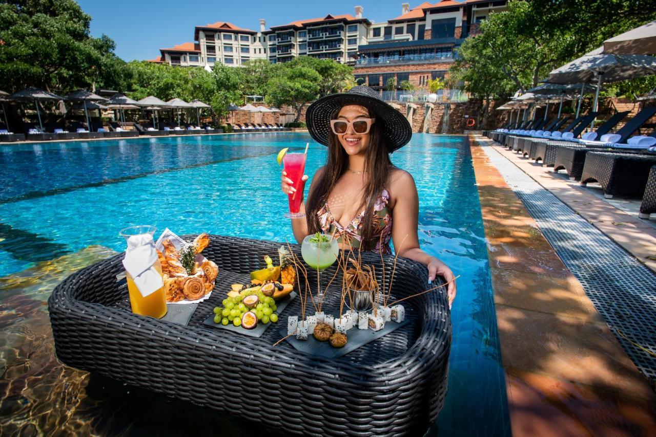 The Capital Zimbali Hotel Ballito Exterior foto Poolside at the hotel